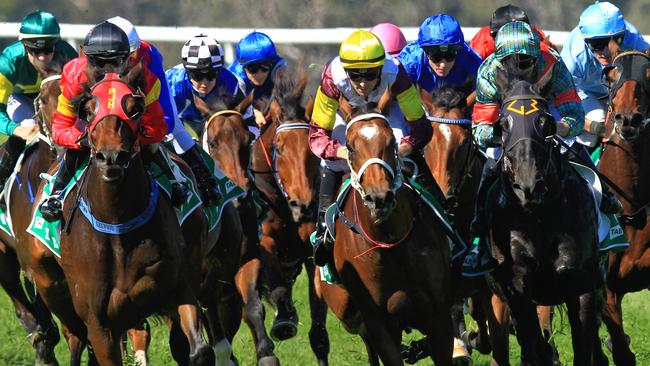 Loving home ridden by Tye Angland  (yellow cap, maroon with yellow armbands) wins race 1 during Scone  Races located in the Upper Hunter Region of NSW. The Bend . Pic Jenny Evans