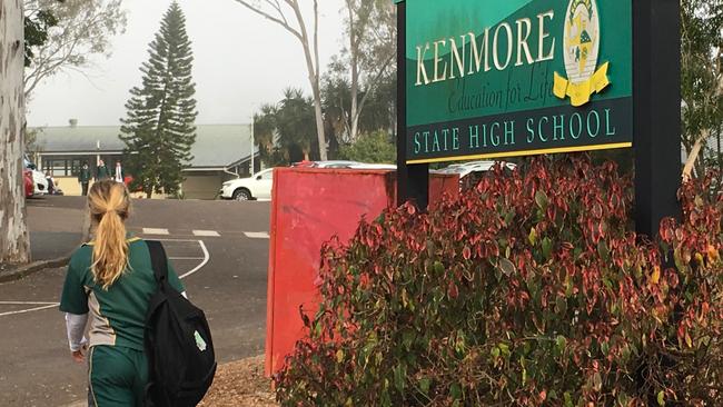 A student attends 'day of dissent' day at Kenmore High State School as part of a planned protest against changes to the uniform policy. Pic: Darren Cartwright