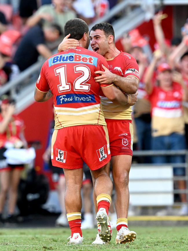 BRISBANE, AUSTRALIA - MARCH 05: Sean O'Sullivan and Kenny Bromwich of the Dolphins celebrate the Dolphins first ever victory in the NRL after the round one NRL match between the Dolphins and Sydney Roosters at Suncorp Stadium on March 05, 2023 in Brisbane, Australia. (Photo by Bradley Kanaris/Getty Images)