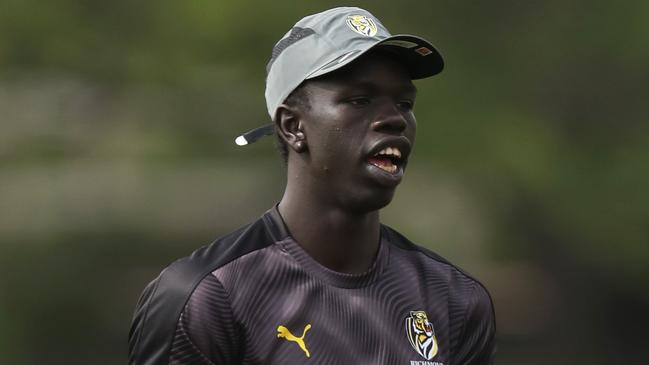 Bigoa Nyuon trains for the first time as a Richmond player.