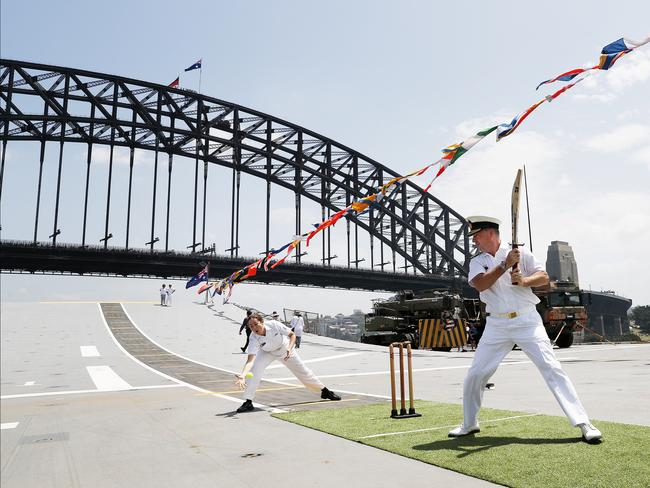 Navy officers play cricket aboard HMAS Canberra on Australia Day in Sydney on Sunday 26th January 2020. Picture: Nikki Short