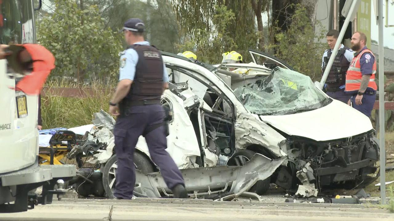 Car smashes into front fence of suburban pub after police chase