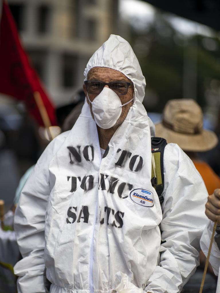 Activists from Extinction Rebellion participate in a protest in Brisbane, Tuesday, October 8, 2019. The Extinction Rebellion climate protests movement has planned a "spring rebellion" from Monday to Sunday, including marches aimed at blocking traffic. (AAP Image/Glenn Hunt) NO ARCHIVING