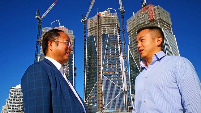 Xiangmo Huang, left, and his son ­Jiquan (Jimmy) at the Jewel site on the Gold Coast.