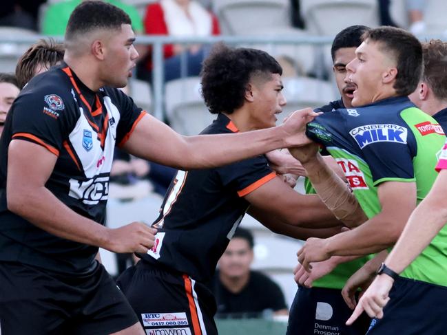 SUNDAY TELEGRAPH, APRIL 23, 2022: Players scuffle with seconds to go in the 2nd half, Harold Matts Cup: Western Suburbs Magpies v Canberra Raiders, Magpies win.Picture: Damian Shaw