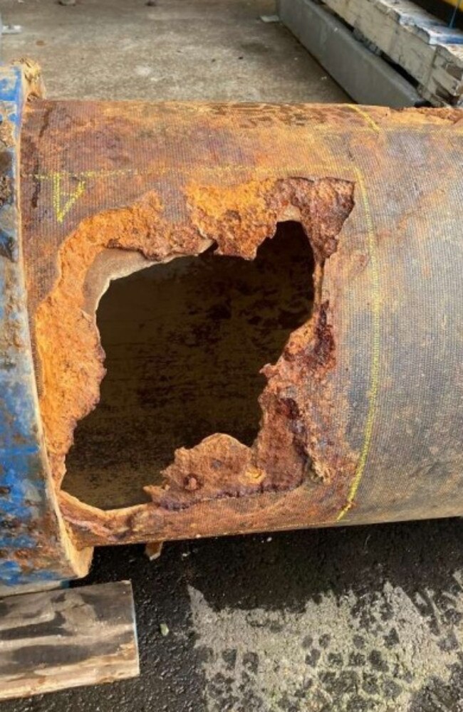 A corroded pipe that was part of the problem, according to the AECOM report.