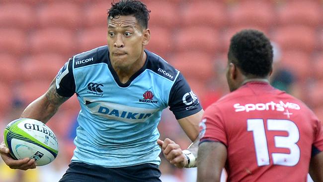 BRISBANE, AUSTRALIA - MARCH 27: Israel Folau of the Waratahs looks to take on the defence during the round five Super Rugby match between the Reds and the Waratahs at Suncorp Stadium on March 27, 2016 in Brisbane, Australia. (Photo by Bradley Kanaris/Getty Images)