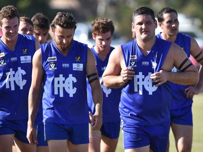 Brendan Fevola (2nd right) exits the field at half time during the MPNFL Div 2 match in Hastings, Melbourne, Saturday, April 20, 2019. MPNFL Div 2 v Devon Meadows V Hastings. (AAP Image/James Ross) NO ARCHIVING