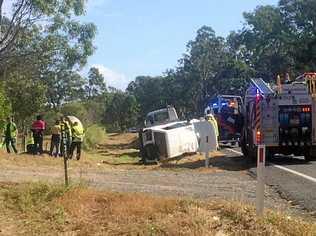 A white Prado has rolled on the Bruce Highway near Curra. Picture: Josh Preston