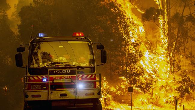 Bawley Point Property Fire. RFS Firefighters desperately worked to save a home on Willinga Drive at Bawley Point on Thursday. Picture Gary Ramage