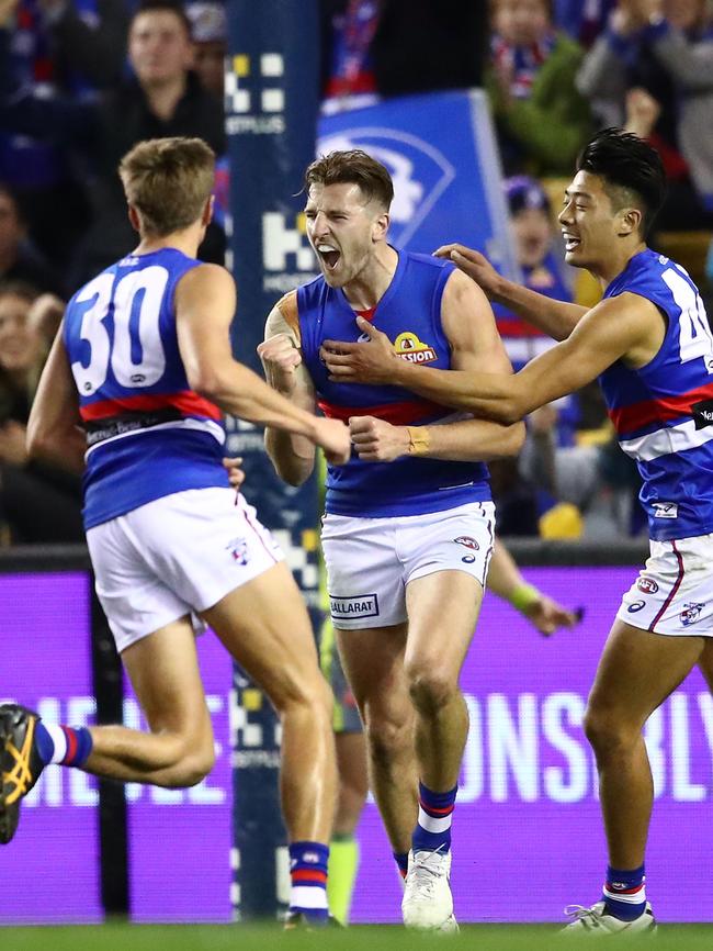 Bulldogs star Marcus Bontempelli celebrates one of his three fourth-quarter goals. Picture: Scott Barbour/Getty Images