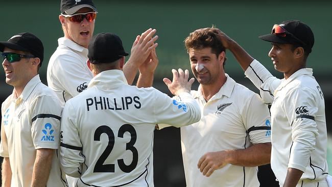 Colin de Grandhomme (second right) got Smith’s wicket this time. Picture: AAP