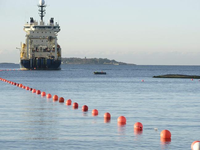 This picture taken on October 12, 2015 shows the C-Lion1 submarine telecommunications cable being laid to the bottom of the Baltic Sea by cable laying ship "Ile de Brehat" off the shore of Helsinki, Finland. Germany and Finland said November 18, 2024 they were "deeply concerned" that an undersea telecommunications cable linking the countries had been severed and opened a probe, at a time of high tensions with Russia. "Our European security is not only under threat from Russia's war of aggression against Ukraine, but also from hybrid warfare by malicious actors," the countries' foreign ministers said in a joint statement. sr/sea/js (Photo by Heikki Saukkomaa / Lehtikuva / AFP) / Finland OUT