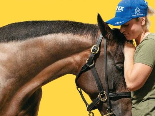 Strapper Candice Persijn with Winx. Picture: James Croucher