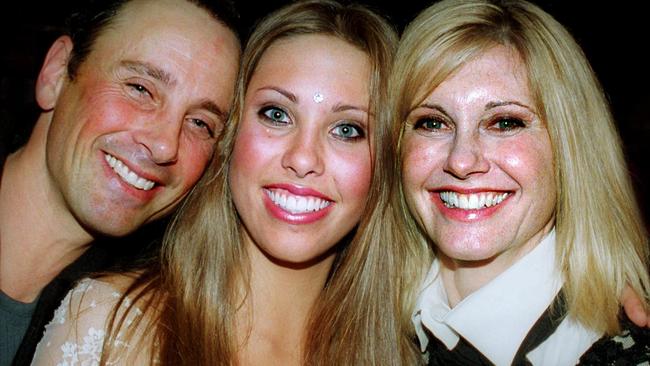 Chloe with dad Matt Lattanzi and mum Olivia Newton John in 2002.