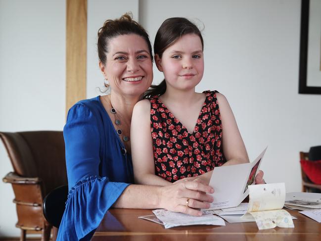 Sydney based Author Suzanne Leal and her daughter Miranda, 8, have been receiving letters from Suzanne's mother's best friend Alison Whittle for years and believe there may have been a resurgence in letter writing during the COVID-19 era. Picture: David Swift.