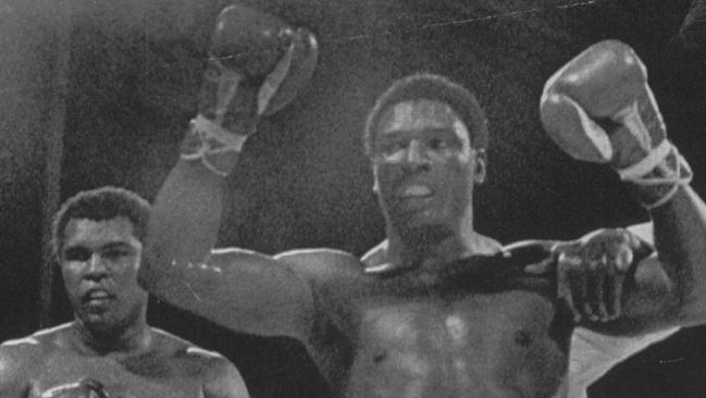 Boxer Trevor Berbick (right) celebrates after beating Muhammad Ali in 1981.