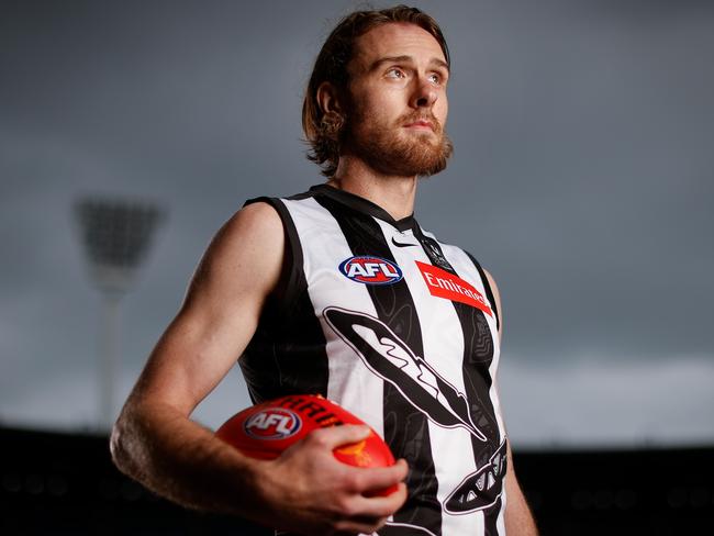 MELBOURNE, AUSTRALIA - MAY 16: Jordan Roughead of the Magpies poses for a photograph in the teams Indigenous guernsey during the 2022 Sir Doug Nicholls Round Launch at the Melbourne Cricket Ground on May 16, 2022 in Melbourne, Australia. (Photo by Michael Willson/AFL Photos via Getty Images)