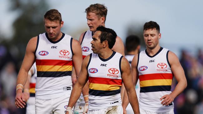 Eddie Betts and his teammates leave the field during the Round 23 AFL match between the Western Bulldogs and the Adelaide Crows at Mars Stadium in Ballarat. Picture: AAP Image/Scott Barbour