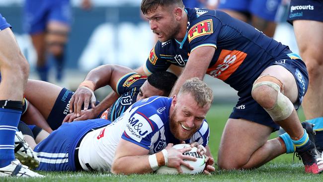 Luke Thompson scores a try, which was then disallowed by the video referee, against the Gold Coast Titans (Photo by Matt King/Getty Images)