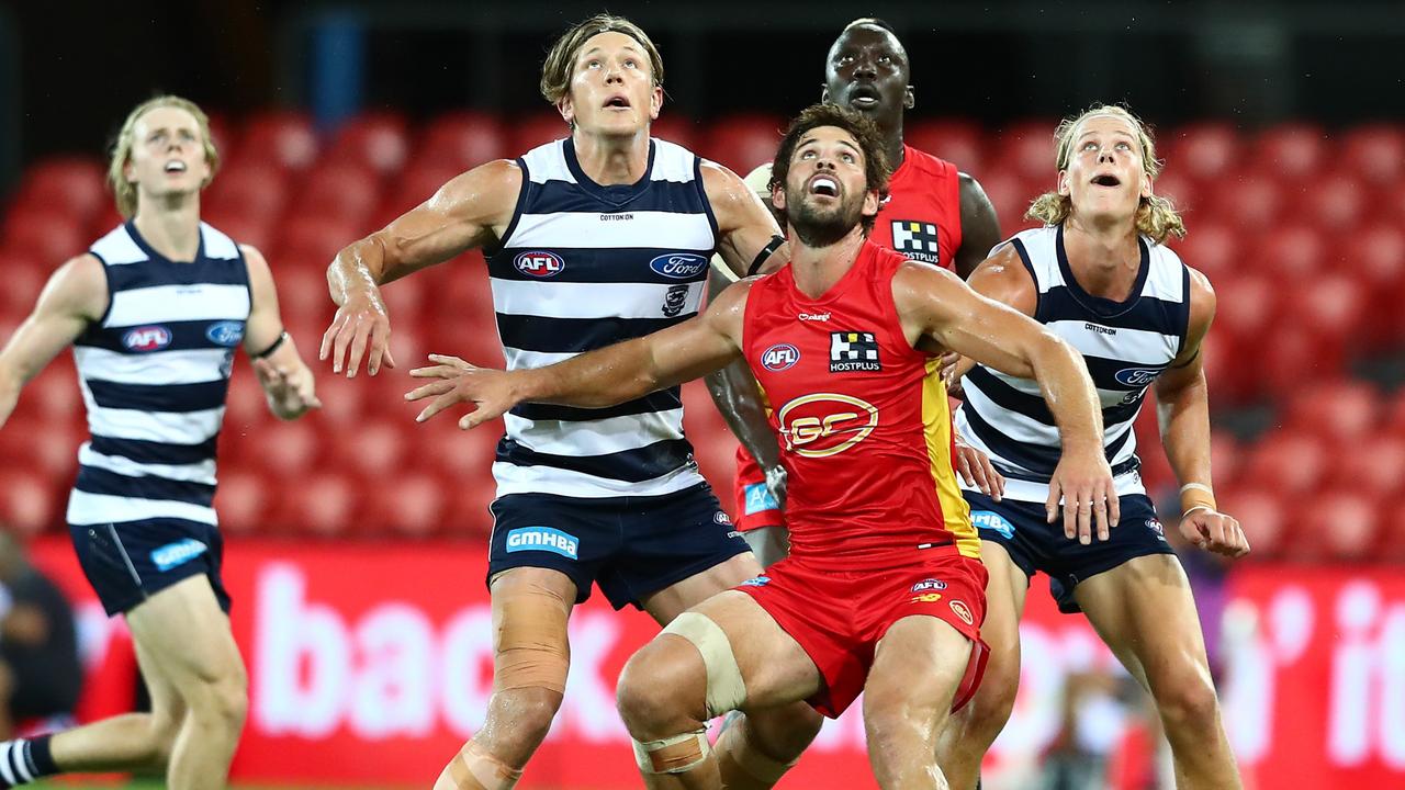 New Suns recruit Levi Casboult takes on Geelong during a AFL AAMI Community Series match at Metricon Stadium.