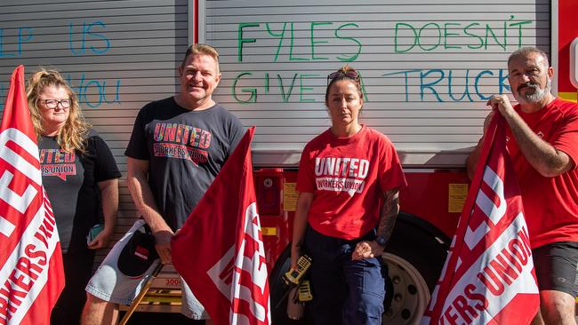 United Workers Union NT secretary Erina Early, left, Darwin leading firefighter Peter Jelly, Marrara senior firefighter Keeley Stewart, and Darwin station officer David Lines protesting the NT Government's pay offer. Picture: Pema Tamang Pakhrin