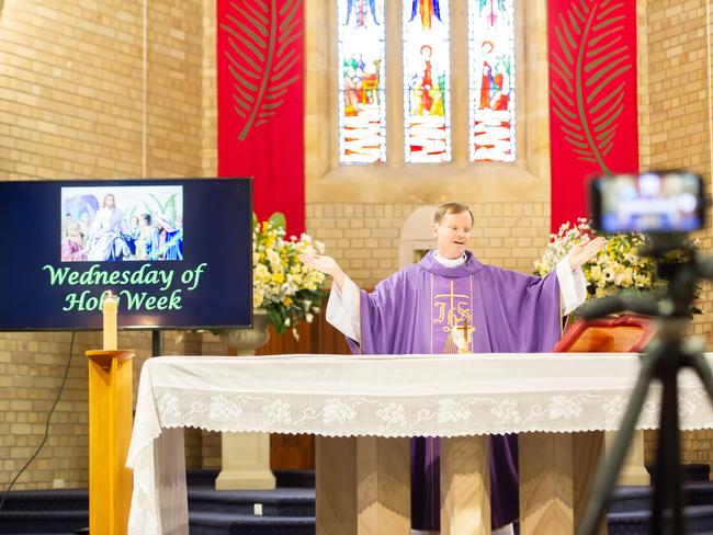 images of Fr Greg Morgan live streaming Mass at St Charles Borromeo Catholic Church, Ryde. I've included vertical &amp; horizontal images or you can just crop as required. Caption must be attributed exactly as follows: Giovanni Portelli / Catholic Archdiocese of Sydney.