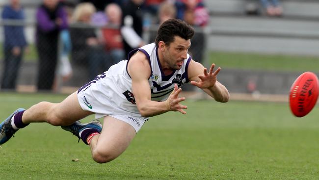 Former Melbourne star Russell Robertson during his days playing for the Burnie Dockers.