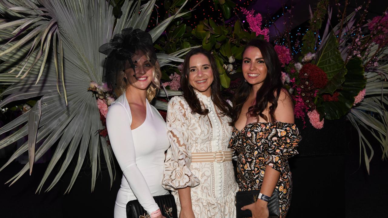 Karen Folkers, Elizabeth Halikos and Lisa Fracaro at the Darwin Turf Club Bridge Toyota Ladies' Day / Derby Day. Picture: KATRINA BRIDGEFORD