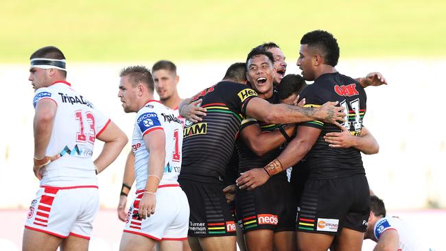 Penrith's Jarome Luai celebrates a try by Nathan Cleary during the St George v Penrith NRL match played behind closed doors at Jubilee Oval, Kogarah. Picture: Brett Costello