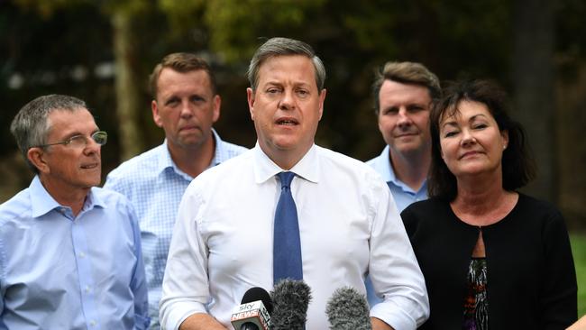 LNP leader Tim Nicholls (centre) with (from left) the Member for Mansfield Ian Walker, Member for Indooroopilly Scott Emerson, Member for Moggill Dr Christian Rowan and the Member for Mt Ommaney Tarnya Smith. Picture: AAP Image/Dan Peled