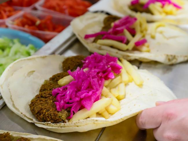 Jamal's Takeaway make hundreds of falafel rolls fresh every day. Picture: Jenifer Jagielski