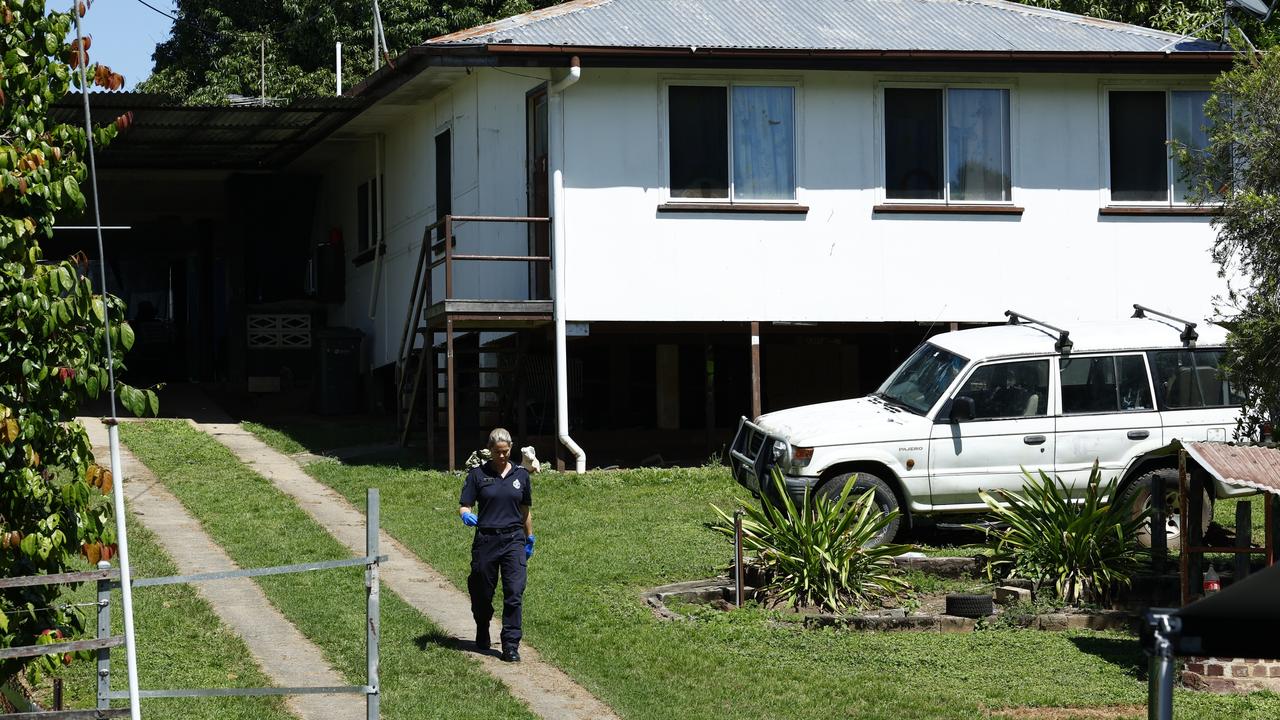 Queensland Police officers guard a crime scene at Love Street, Mareeba, where a man armed with a knife was shot dead by police after a tense, hours long stand off on Saturday afternoon. Picture: Brendan Radke