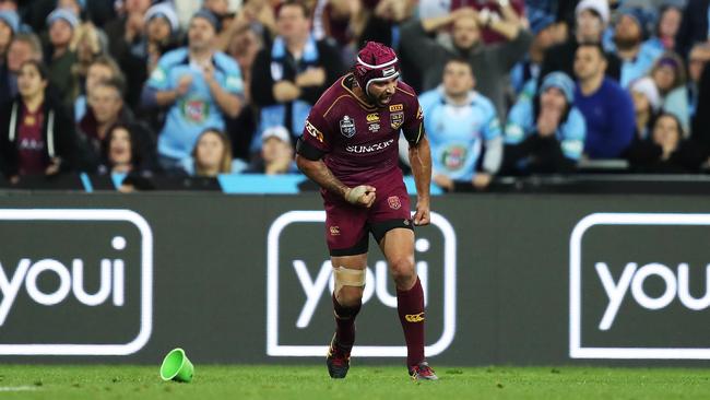 Johnathan Thurston celebrates after kicking the winning conversion in State of Origin II. Picture: Brett Costello