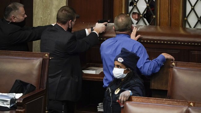 Pro-Trump Protesters Force Way Into Capitol, Prompting Lockdown