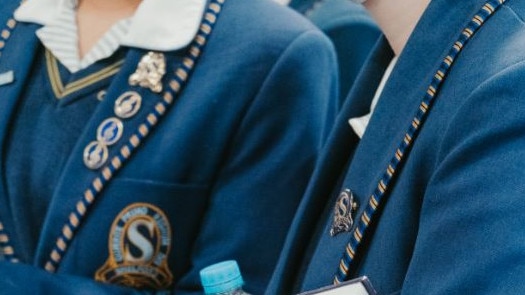 Shelford Girls' Grammar is in a dispute with families about scholarship school fees.