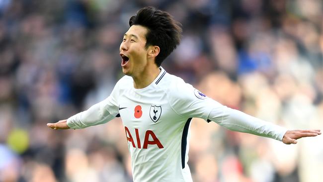 Heung-Min Son celebrates scoring.