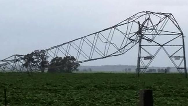 Transmission towers carrying power lines near Melrose were likely toppled by tornadoes and high winds. Picture: Debbie Prosser/AFP