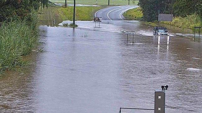 A 4wd drives through flooded water near Goldsborough. Photo: Dylan Thomas