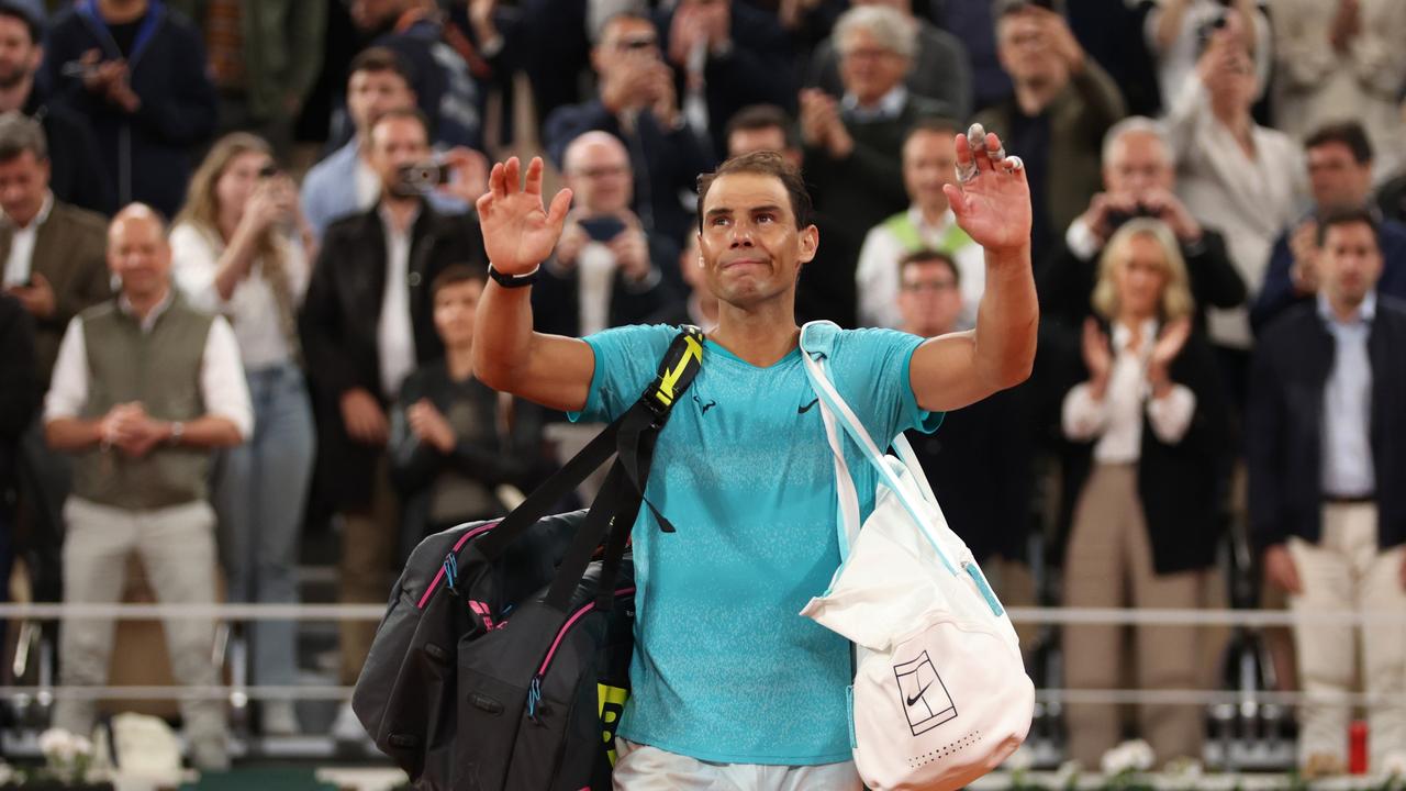 PARIS, FRANCE - MAY 27: Rafael Nadal of Spain waves to the crowd as he walks off after his defeat by Alexander Zverev of Germany in the Men's Singles first round match on Day Two of the 2024 French Open at Roland Garros on May 27, 2024 in Paris, France. (Photo by Clive Brunskill/Getty Images)