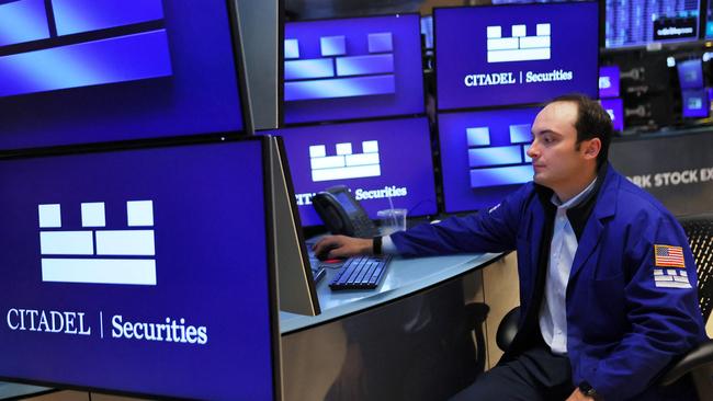 Traders work on the floor of the New York Stock Exchange. Picture: Michael M. Santiago/AFP
