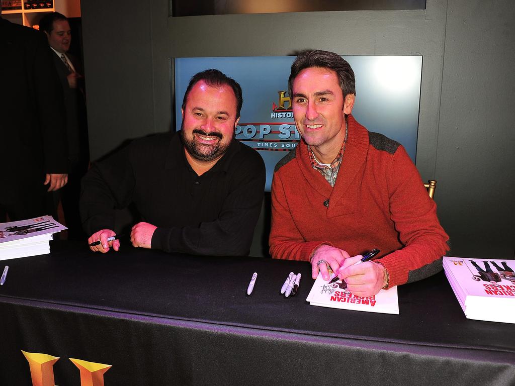 Fritz and Wolfe from American Pickers sign autographs for fans during the grand opening of the History Pop Shop at History Pop Shop on December 6, 2010 in NYC. Picture: Brian Killian/WireImage