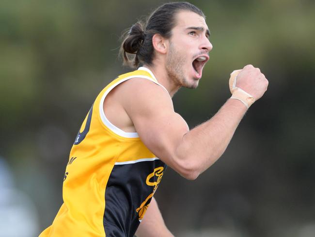 Frankston YCW forward Luke Paynter celebrates one of his four goals against Edi-Asp on Saturday. Picture: Chris Eastman