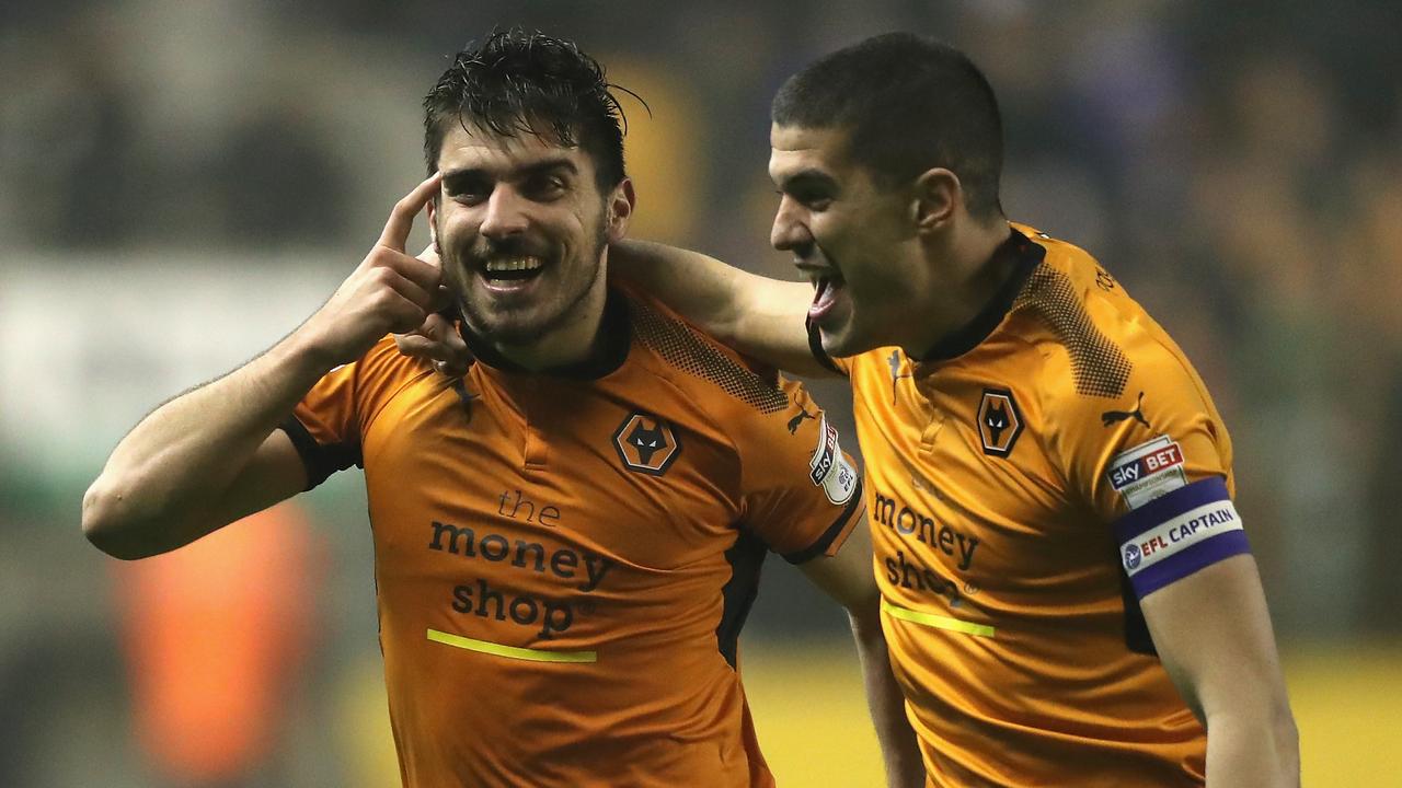 Ruben Neves (L) of Wolverhampton Wanderers celebrates with team mate Conor Coady