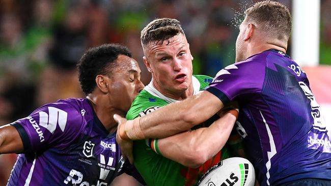 Jack Wighton is wrapped up by the Storm defence at Suncorp Stadium. Picture: Getty Images