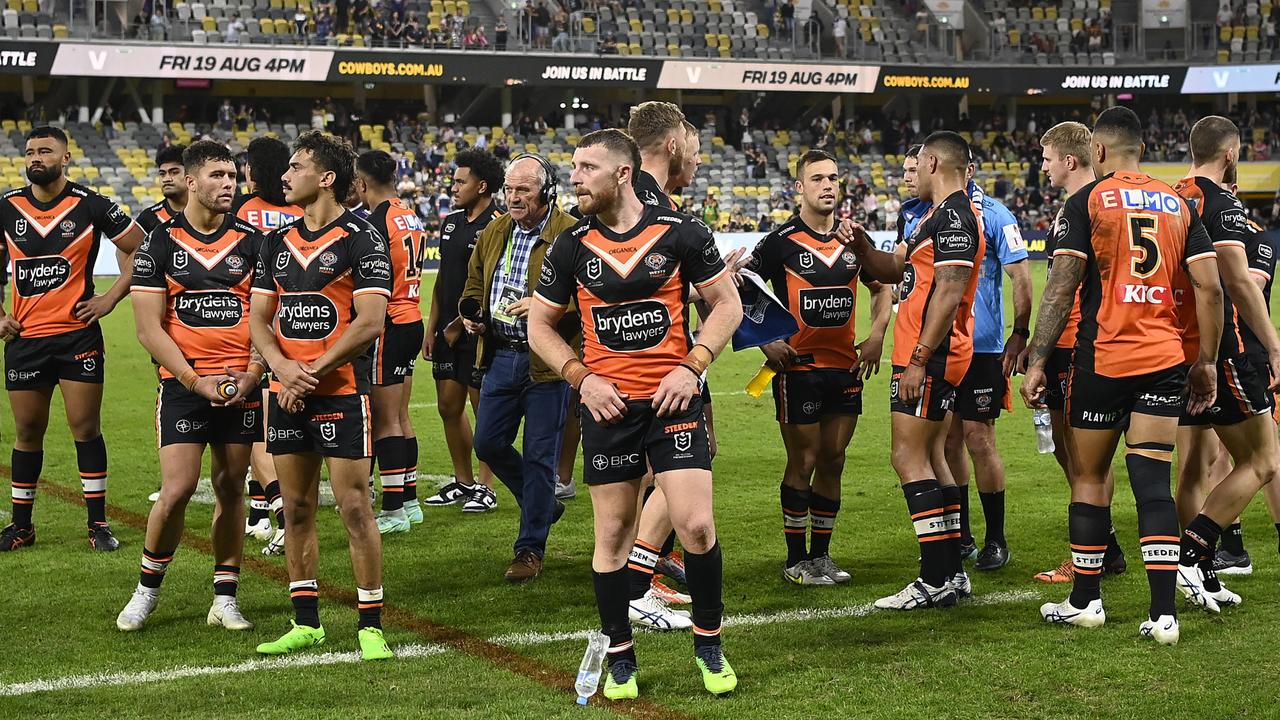 TOWNSVILLE, AUSTRALIA - JULY 24: The Tigers look dejected after losing the round 19 NRL match between the North Queensland Cowboys and the Wests Tigers at Qld Country Bank Stadium, on July 24, 2022, in Townsville, Australia. (Photo by Ian Hitchcock/Getty Images)