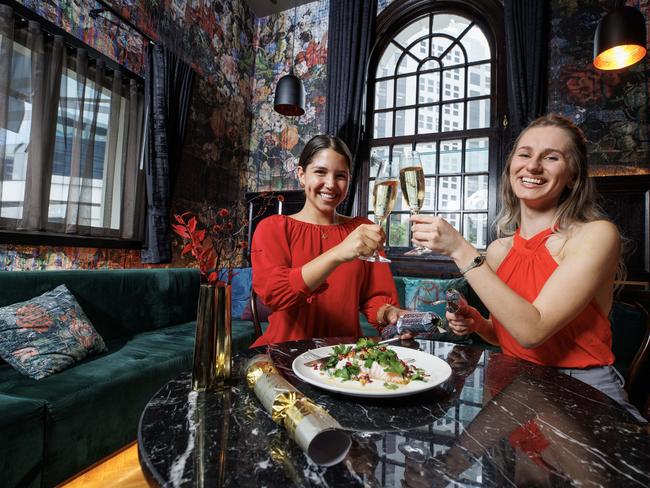 Lucia Ramirez and Brodi Bojack test out the Christmas menu at The Inchcolm. Picture: Lachie Millard