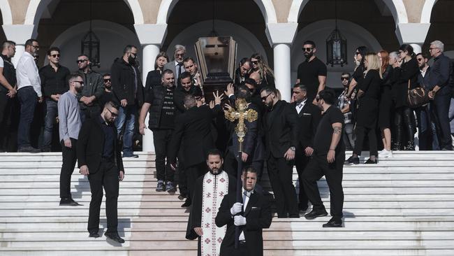 The coffin of slain Greek-Australian John Macris is carried out of an Orthodox church after his funeral ceremony, at Voula suburb, south of Athens on Sunday, November 4. Picture: Yorgos Karahalis/AP