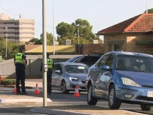 A man has been rushed to hospital with serious injuries after being struck by a car at a pedestrian crossing on busy Sturt Road at Marion.  Picture: 7NEWS