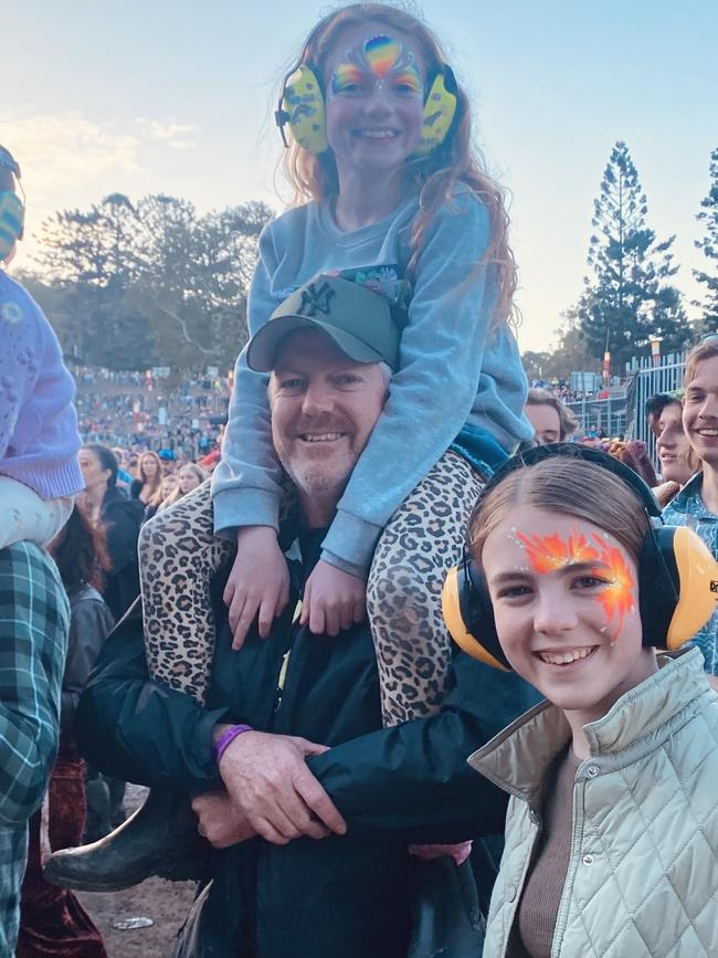 Graeme Jack of Bravado Asia Pacific, pictured at Splendour in the Grass with his daughters Sadie (on shoulders) and Matilda Jack.